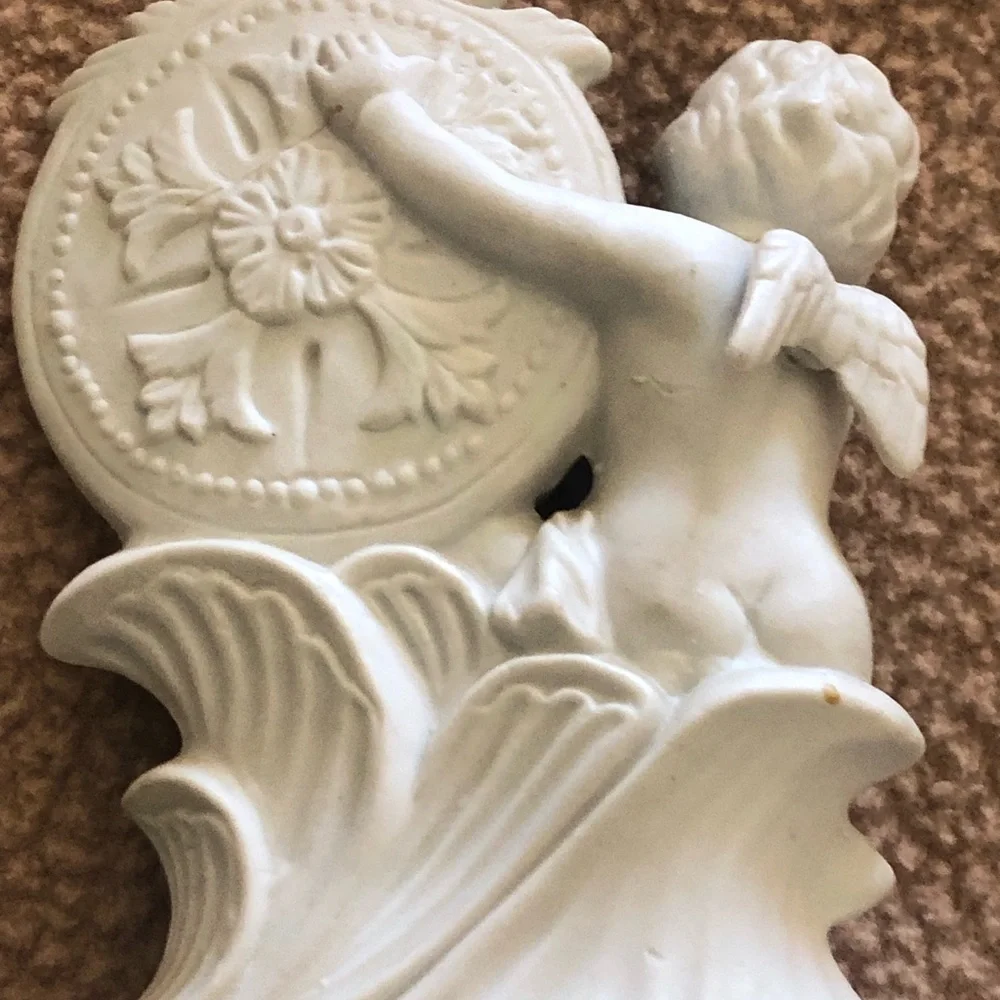 White Cherub Accent Mirror with Floral Motif And Bisque Two White Roses